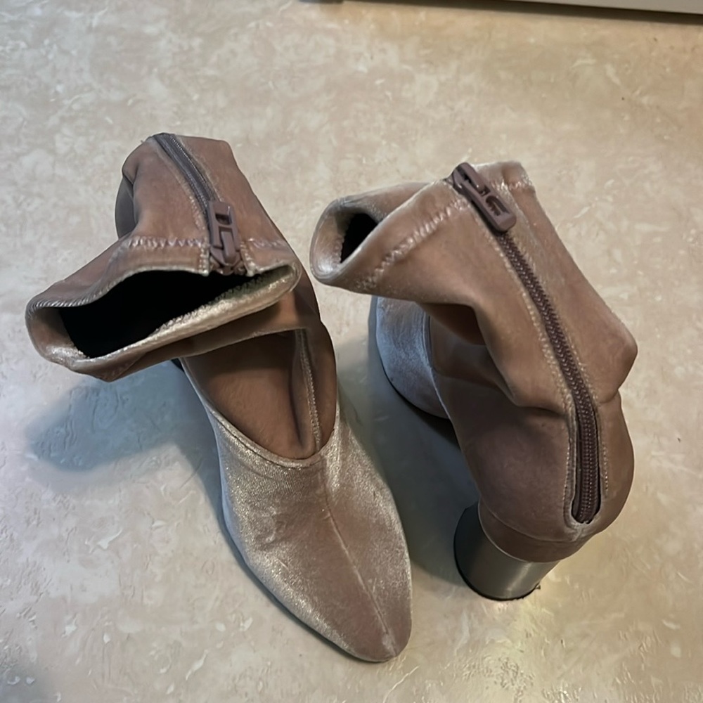 Gently worn. Suede. Chic and designer!!
